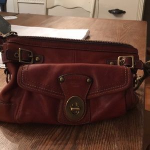 - Coach vintage whiskey purse.
